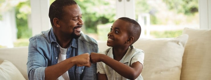 Father son fistbump (820 x 312)